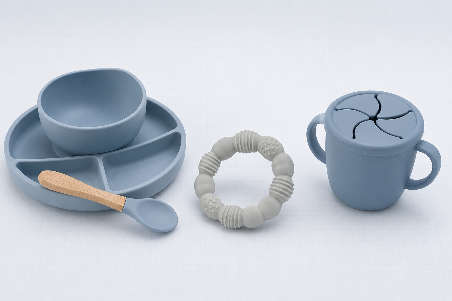 Three soft-touch silicone baby product forms in a calm studio composition.